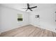 Bedroom with new floors, white walls, closet, and a ceiling fan at 3451 Birchwood Trl, Snellville, GA 30078