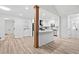 Open concept area with a kitchen in the background at 3451 Birchwood Trl, Snellville, GA 30078