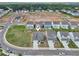 Aerial view of new homes in a suburban neighborhood. Includes lawns and cul-de-sac at 3698 Annsbury Ct, Lilburn, GA 30047