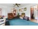 Cozy living room with hardwood floors and natural light at 5335 Old Floyd Sw Rd, Mableton, GA 30126