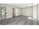 Bedroom with modern wood flooring and ensuite bathroom at 1009 Riverbend Club Se Dr, Atlanta, GA 30339