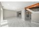 Living room with stairs to a second floor and a marble-like floor at 1009 Riverbend Club Se Dr, Atlanta, GA 30339