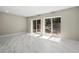 Sunlit room with modern doors and a view of the rock garden at 1009 Riverbend Club Se Dr, Atlanta, GA 30339
