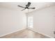 Minimalist bedroom featuring hardwood floors and a ceiling fan at 255 Briscoe Way # 5, Alpharetta, GA 30009