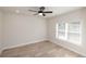 Bedroom with hardwood floors, a ceiling fan, and a window at 255 Briscoe Way # 5, Alpharetta, GA 30009