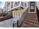 Brick stairs lead to a brown front door with a black metal railing at 255 Briscoe Way # 5, Alpharetta, GA 30009