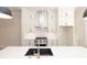 Bright kitchen with stainless steel appliances, white cabinets, and modern fixtures at 255 Briscoe Way # 5, Alpharetta, GA 30009