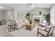 Cozy living room featuring neutral furniture, fireplace, and plant accents at 402 Leslie Ct, Mcdonough, GA 30253