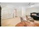 Spacious bedroom featuring neutral color scheme, and two sitting chairs at 4201 Village Green Dr, Roswell, GA 30075