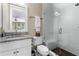 Bathroom featuring a granite countertop vanity and glass-enclosed shower at 1059 Abington Ct, Brookhaven, GA 30319