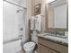 Cozy bathroom with a shower-tub combo, granite counters and neutral decor at 1059 Abington Ct, Brookhaven, GA 30319