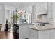 Bright kitchen featuring stainless steel appliances, an island, and modern lighting at 1059 Abington Ct, Brookhaven, GA 30319