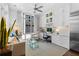 Sun-filled living room features a built-in desk, white cabinets, and comfortable seating at 1059 Abington Ct, Brookhaven, GA 30319