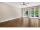 Spacious living room with wood flooring and large windows letting in natural light at 1059 Abington Ct, Brookhaven, GA 30319