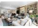 Open-concept living area with comfortable seating, a fireplace, and seamless flow into the dining area at 1059 Abington Ct, Brookhaven, GA 30319