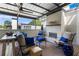 Inviting outdoor patio featuring a fireplace, comfortable seating, and stylish decor at 1059 Abington Ct, Brookhaven, GA 30319