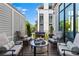Charming patio with stylish outdoor furniture and bright blue sky at 1059 Abington Ct, Brookhaven, GA 30319