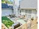 Back patio area perfect for outdoor dining, lounge seating, and gas grill at 1325 Richland Creek Ct, Sugar Hill, GA 30518