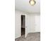 Neutral bedroom featuring carpet floors and white trim and doors at 1444 Bridgewater Br, Stone Mountain, GA 30088