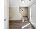 Inviting foyer featuring hardwood floors, staircase, and a bright entryway at 1444 Bridgewater Br, Stone Mountain, GA 30088