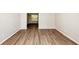 Spacious living room featuring hardwood floors and ample natural light at 1444 Bridgewater Br, Stone Mountain, GA 30088