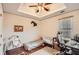 Bedroom featuring wood floors, a ceiling fan, and a neutral color scheme for a cozy, inviting atmosphere at 4719 Score Ct, Snellville, GA 30039