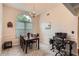 Formal dining room features a chandelier, wainscoting, and ample natural light at 4719 Score Ct, Snellville, GA 30039