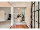 Open-concept living room with fireplace, ceiling fan, and plenty of natural light at 4719 Score Ct, Snellville, GA 30039