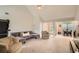 Expansive living space with vaulted ceiling, neutral decor, and adjacent dining area at 4719 Score Ct, Snellville, GA 30039