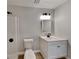 Bathroom with modern vanity, shower, and updated fixtures at 132 Garden Manor Ct, Loganville, GA 30052