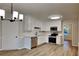 Bright kitchen with stainless steel appliances, white cabinetry, and a modern design at 132 Garden Manor Ct, Loganville, GA 30052