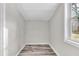 A small walk-in closet with gray flooring and white walls at 164 Polar Rock Sw Dr, Atlanta, GA 30315