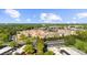 Large building surrounded by lush trees and plenty of parking at 2103 Stratford Commons, Decatur, GA 30033