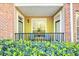 Inviting balcony with lush green plants and patio furniture, perfect for enjoying the outdoors at 2103 Stratford Commons, Decatur, GA 30033