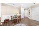 Dining area with hardwood floors, wainscoting, and convenient built-in storage at 2103 Stratford Commons, Decatur, GA 30033