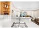 Kitchen island and sink, offering a view into the dining and living areas at 2103 Stratford Commons, Decatur, GA 30033