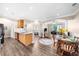 Open-concept living and kitchen area with hardwood floors and lots of natural light at 2103 Stratford Commons, Decatur, GA 30033
