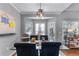 Comfortable dining area features large windows that bring in lots of light at 705 Branch Tree Way, Lawrenceville, GA 30043