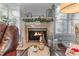 Close up of a cozy fireplace featuring stylish decor at 705 Branch Tree Way, Lawrenceville, GA 30043