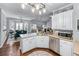 Well-lit kitchen with stainless steel appliances and plentiful counter space, great for meal prep at 705 Branch Tree Way, Lawrenceville, GA 30043