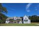 Charming two-story home featuring a well-maintained lawn and inviting front porch at 1685 Crumbley Rd, Mcdonough, GA 30252