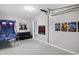 Game room featuring multiple activities and a sofa for relaxation and entertainment at 3568 Foxworth Ct, Buford, GA 30519