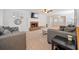 Spacious living room with a brick fireplace, plush carpeting, and neutral décor at 401 Briardale Court, Woodstock, GA 30189