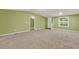 Inviting open-plan living room featuring a large window and neutral carpet at 4653 Anns Se Trce, Acworth, GA 30102