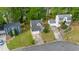 Aerial view of a home with a well-manicured lawn and mature trees on a sunny day at 536 Crestridge Ct, Stone Mountain, GA 30083