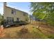 Spacious backyard featuring a wooden deck and outdoor furniture for entertaining at 536 Crestridge Ct, Stone Mountain, GA 30083