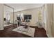 Bedroom featuring a mirrored closet, wood flooring, and natural light at 536 Crestridge Ct, Stone Mountain, GA 30083