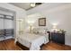 Well-lit bedroom with wood floors and built-in storage at 620 Glen Iris Ne Dr # 410, Atlanta, GA 30308