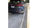 Gray car in a parking spot with the number 145 at 620 Glen Iris Ne Dr # 410, Atlanta, GA 30308