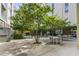 Landscaped courtyard with outdoor seating and relaxing common area at 620 Glen Iris Ne Dr # 410, Atlanta, GA 30308